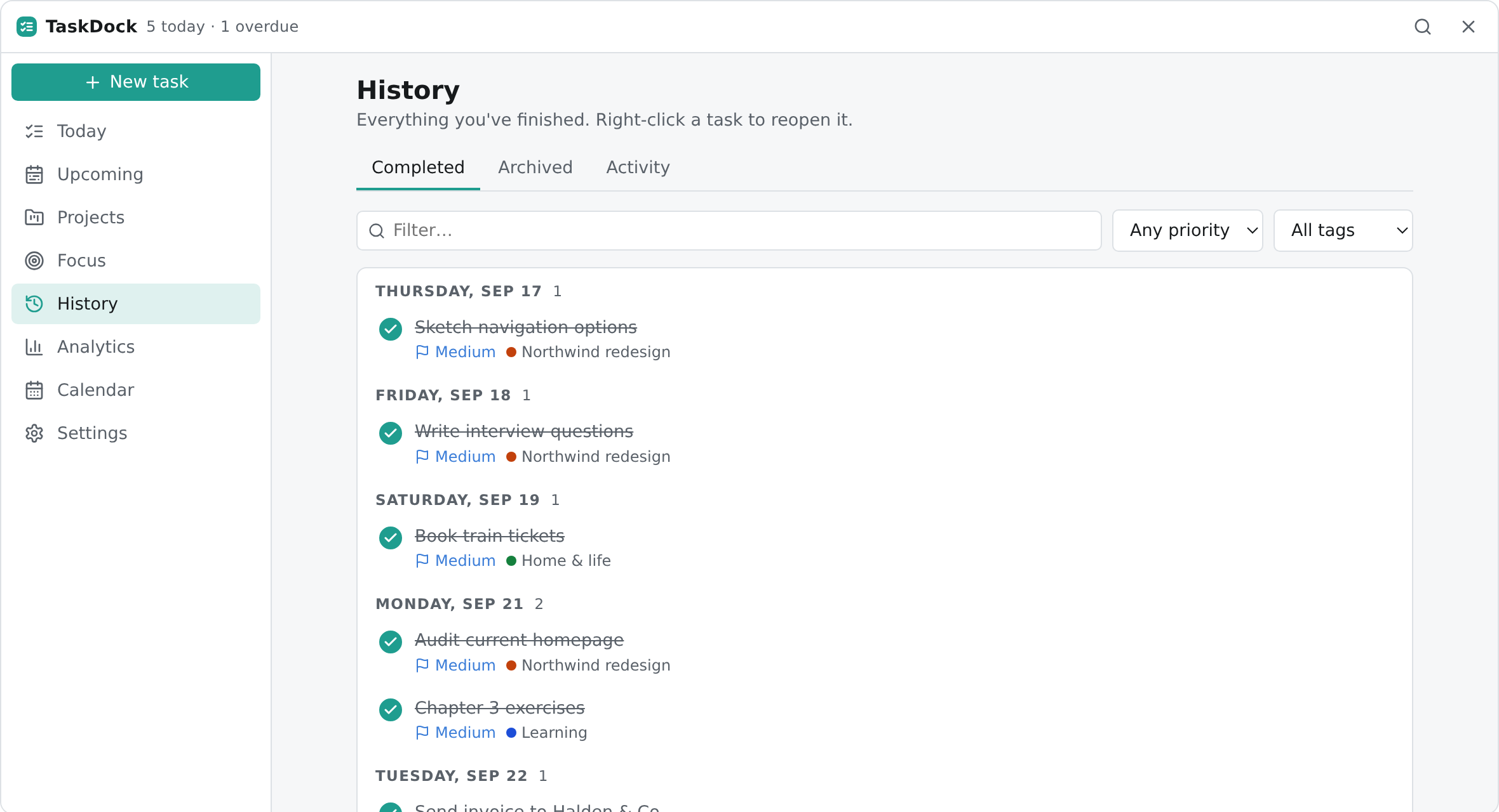 The History page listing completed tasks grouped by day